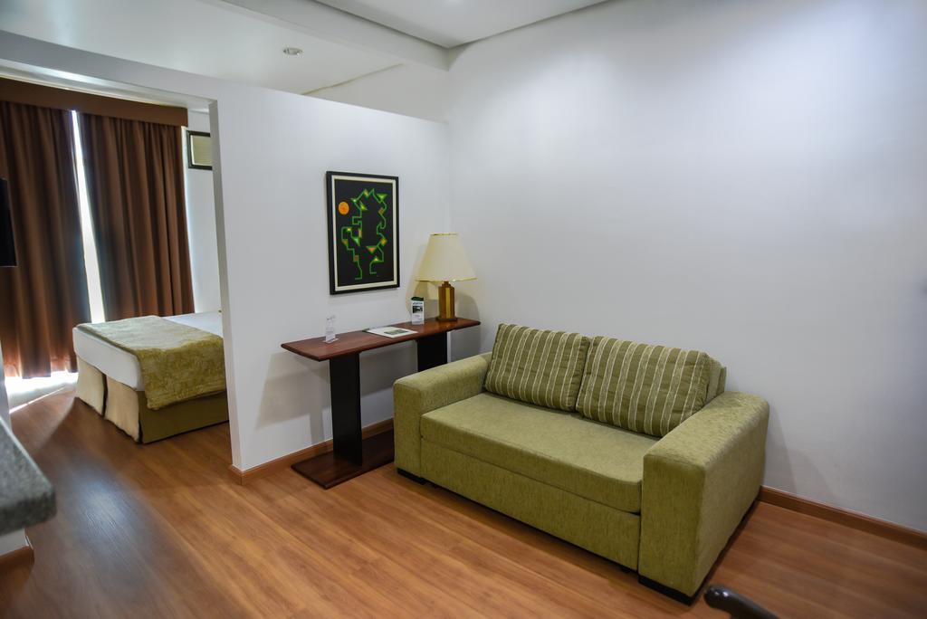 Podium Apart Hotel Varginha  Rom bilde